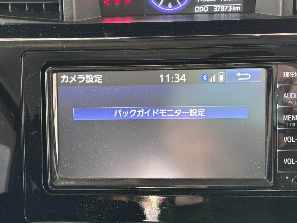トヨタ ルーミーの純正ナビNSCN-W68に表示されたカメラ設定画面とバックガイドモニター設定メニュー